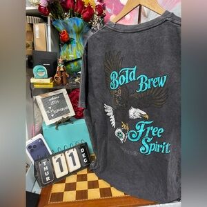 Caliber Coffee Company t-shirt.